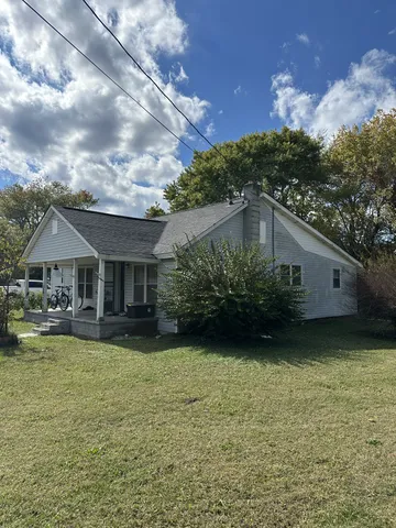 a house view with a garden space