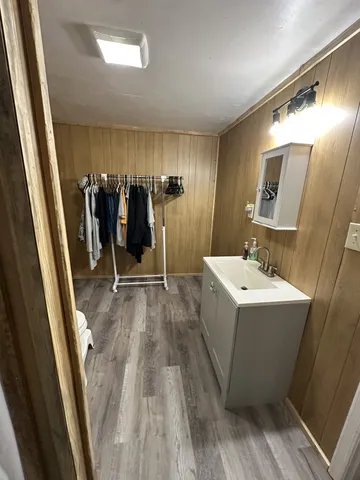 a kitchen with stainless steel appliances a refrigerator sink and cabinets