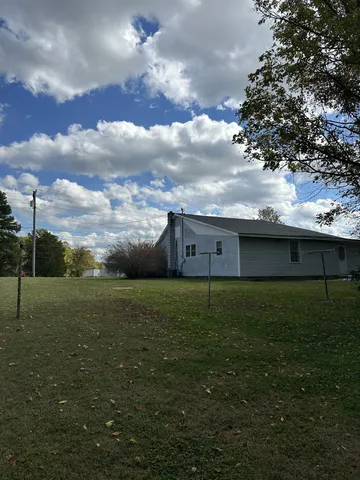 a view of a house with a big yard