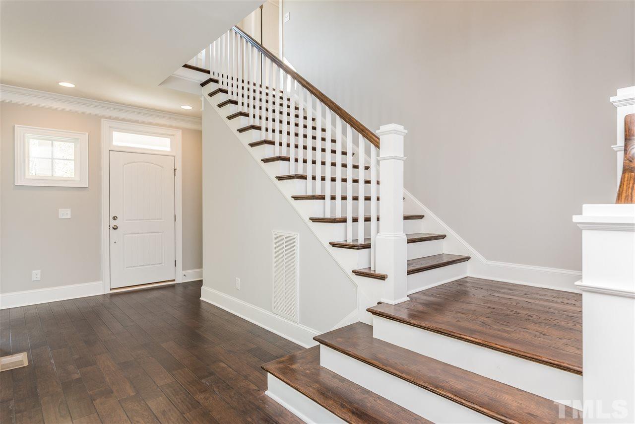 1121 Harrison Ridge Road Wake Forest, NC 27587 - Photo 3 of 25 a view of entryway and hall with wooden floor