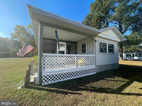 35401 Mallard Road Millsboro, DE 19966 - Photo 1 of 1 a view of a house with a yard