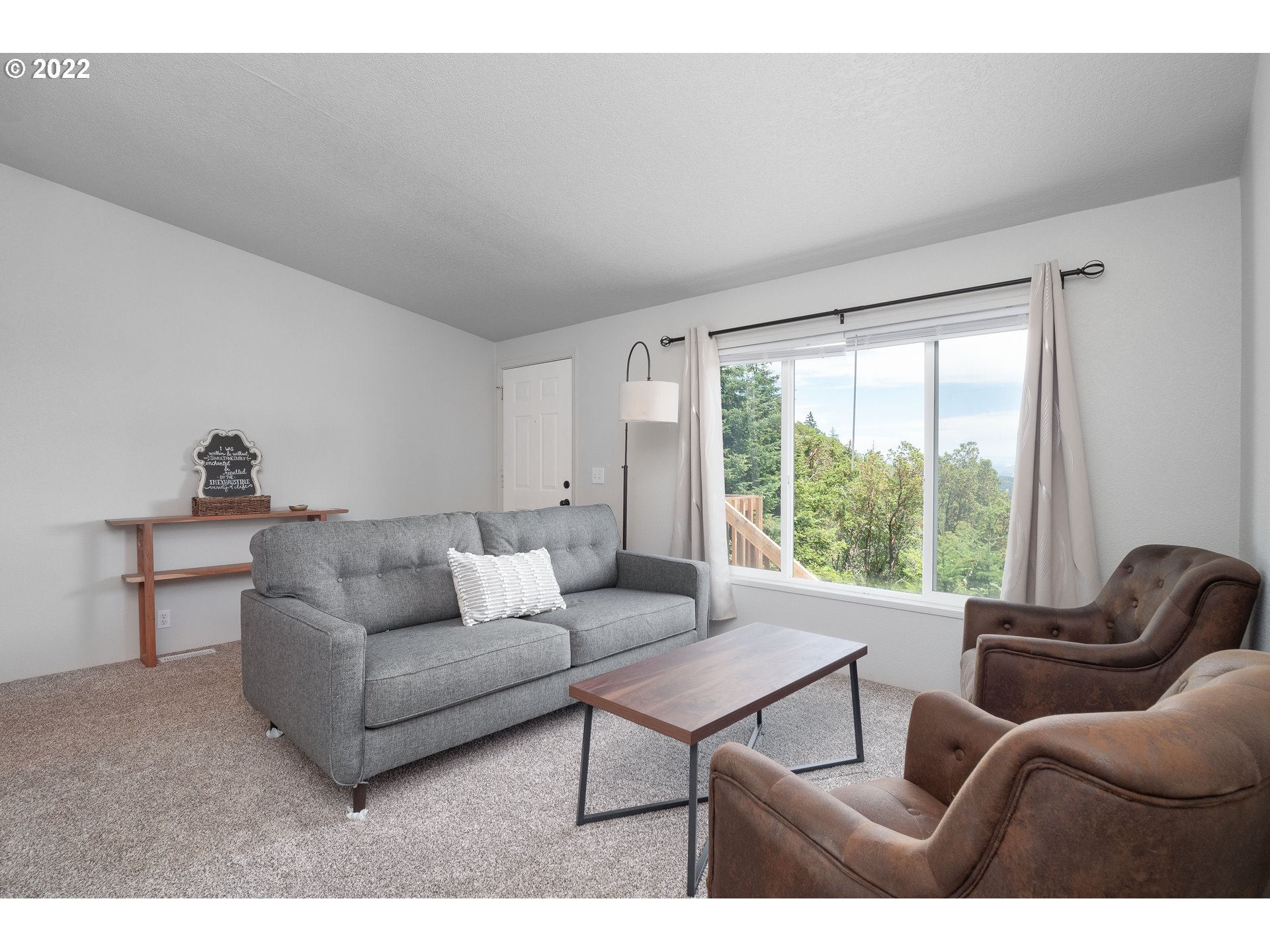 1499 Callahan Road Roseburg, OR 97471 - Photo 12 of 32 a living room with furniture and a window