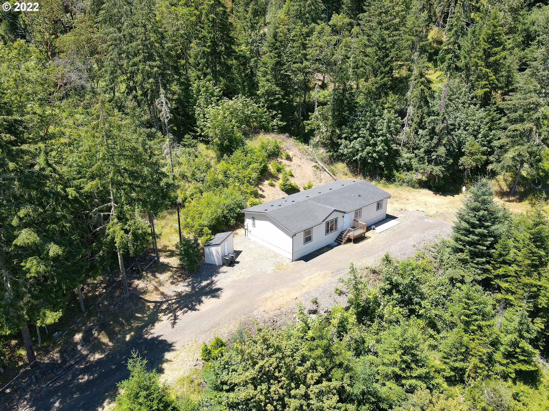 1499 Callahan Road Roseburg, OR 97471 - Photo 5 of 32 a view of a pathway of a forest