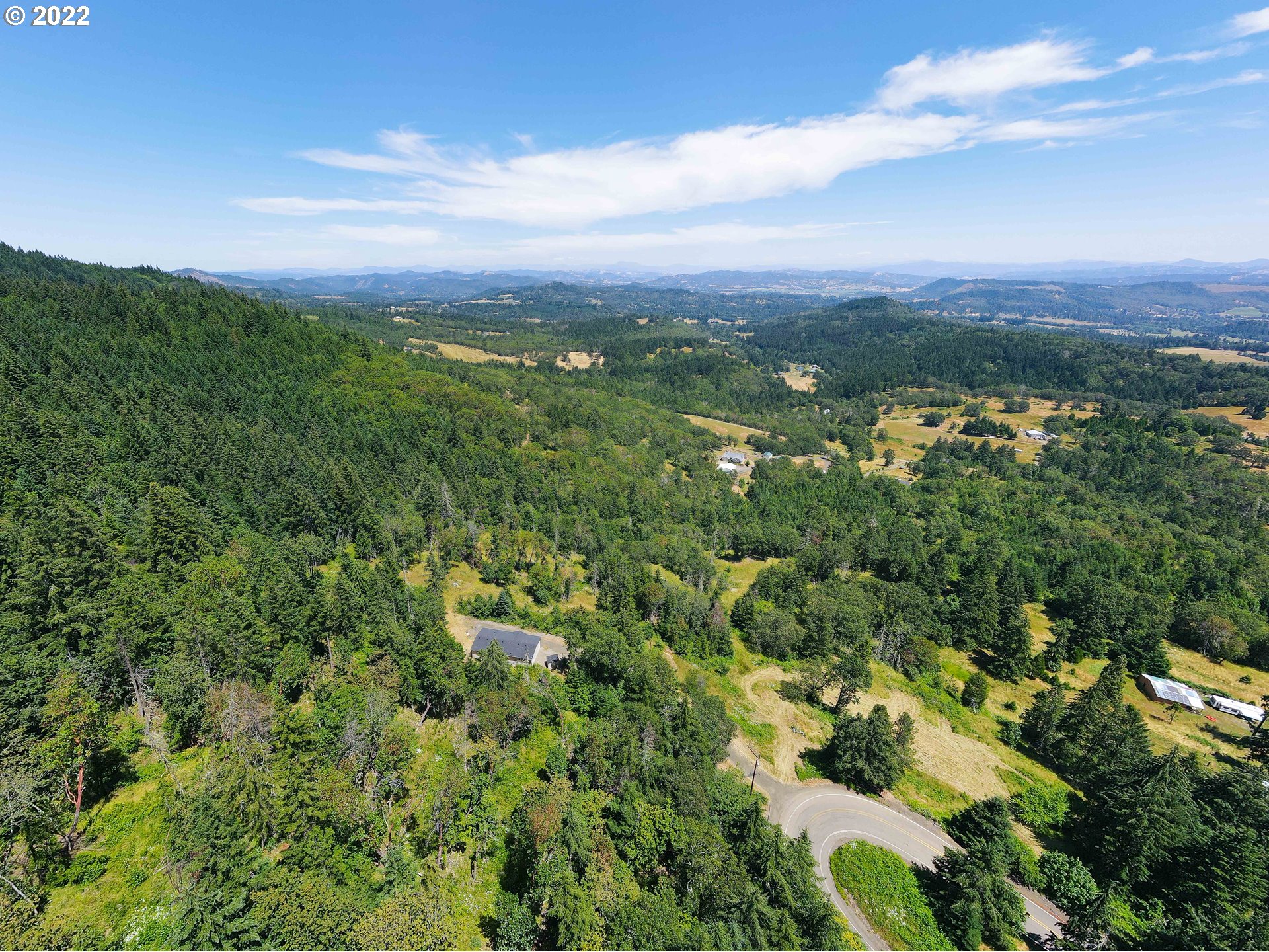 1499 Callahan Road Roseburg, OR 97471 - Photo 9 of 32 an aerial view of residential houses with outdoor space and trees