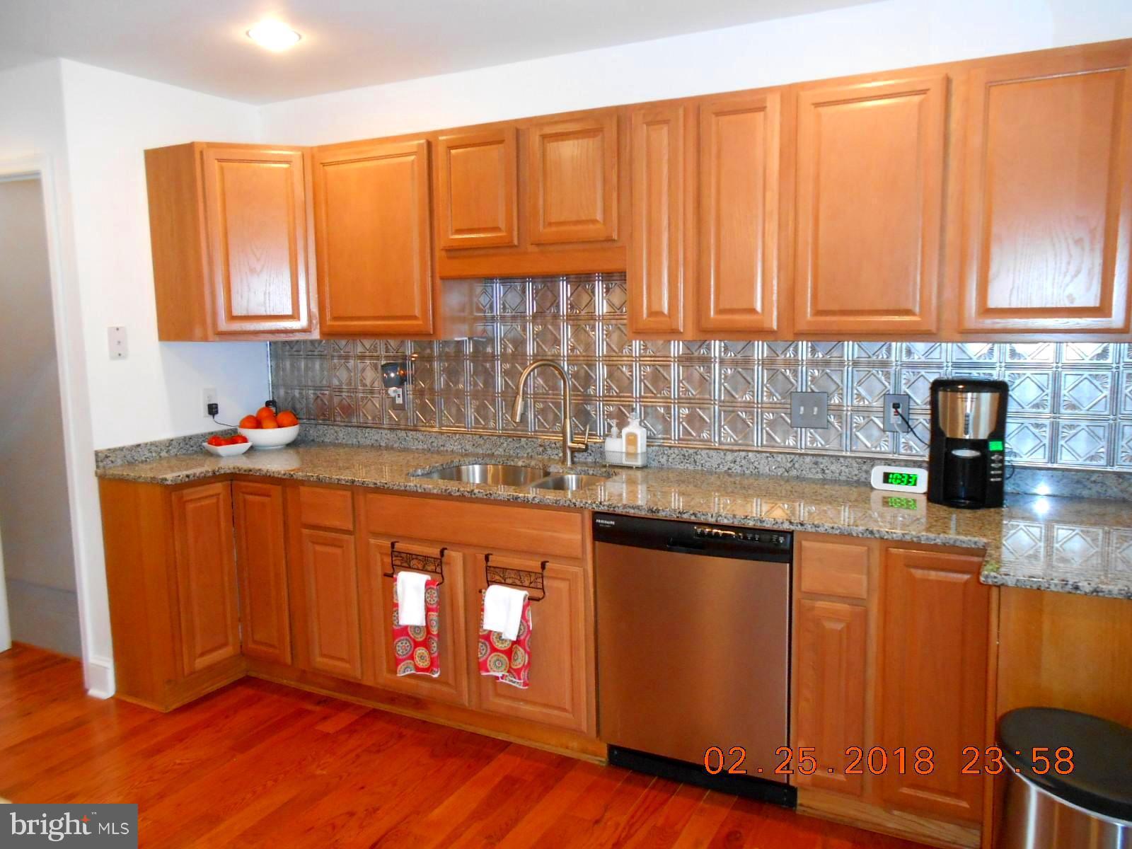 930 Elm Ridge Avenue Baltimore, MD 21229 - Photo 9 of 24 Granite Counter tops, Stainless Steel Appliances