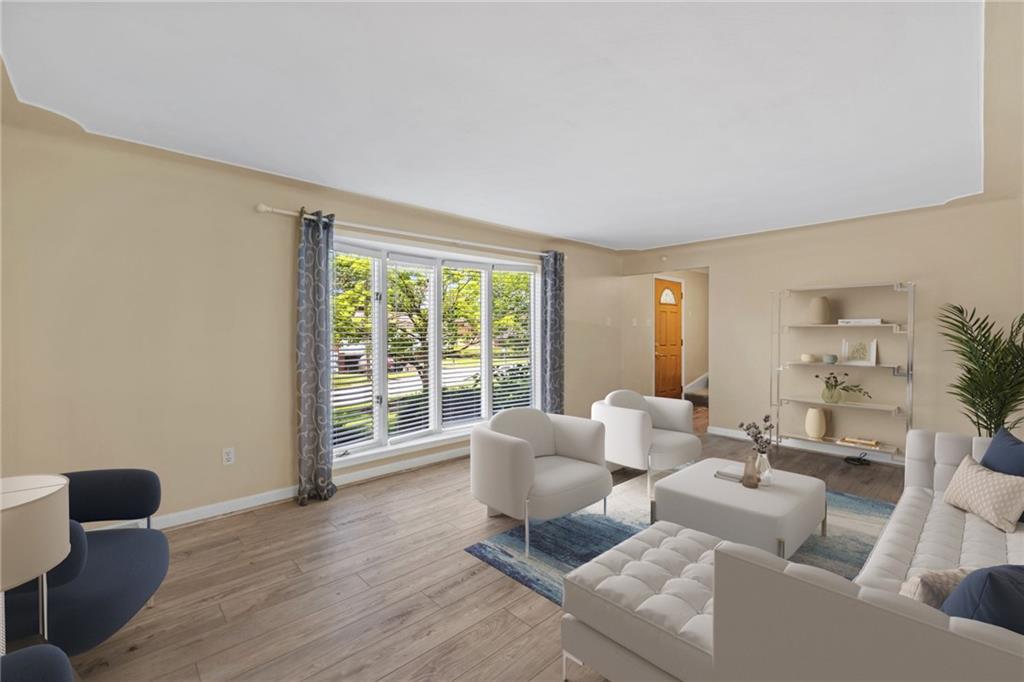 1304 Cathell Road Pittsburgh, PA 15236 - Photo 7 of 48 Natural light streams through the floor to ceiling bay window.