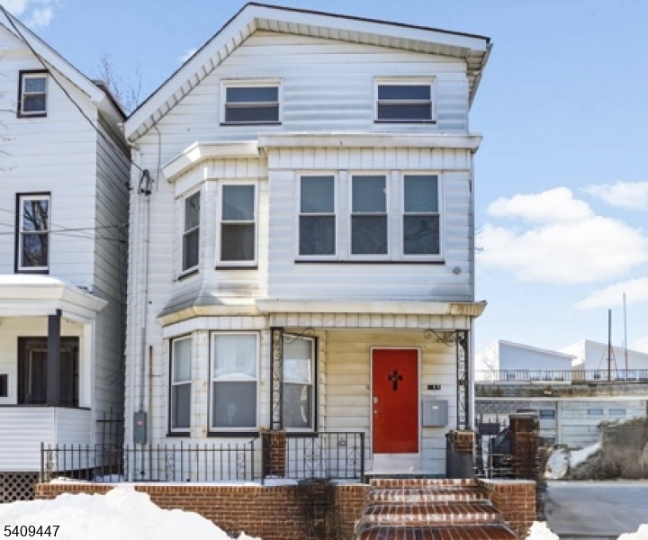 196 2nd Street Newark, NJ 07107 - Photo 9 of 9 a front view of a building with glass windows