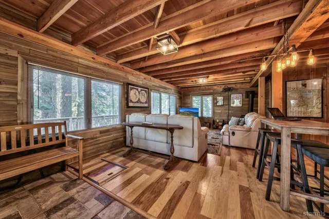 a view of a chairs in wooden floor