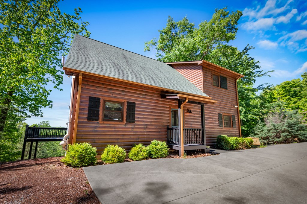 479 Big Timber Road Mineral Bluff, GA 30559 - Photo 59 of 60 a front view of a house with a yard