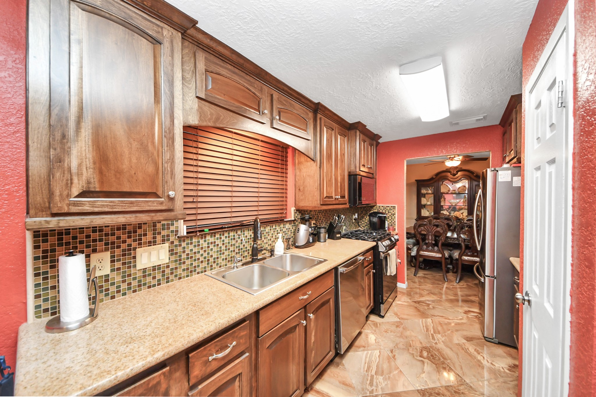 37 Wagon Ln Loop Angleton, TX 77515 - Photo 11 of 42 a bathroom with a sink double vanity and a mirror