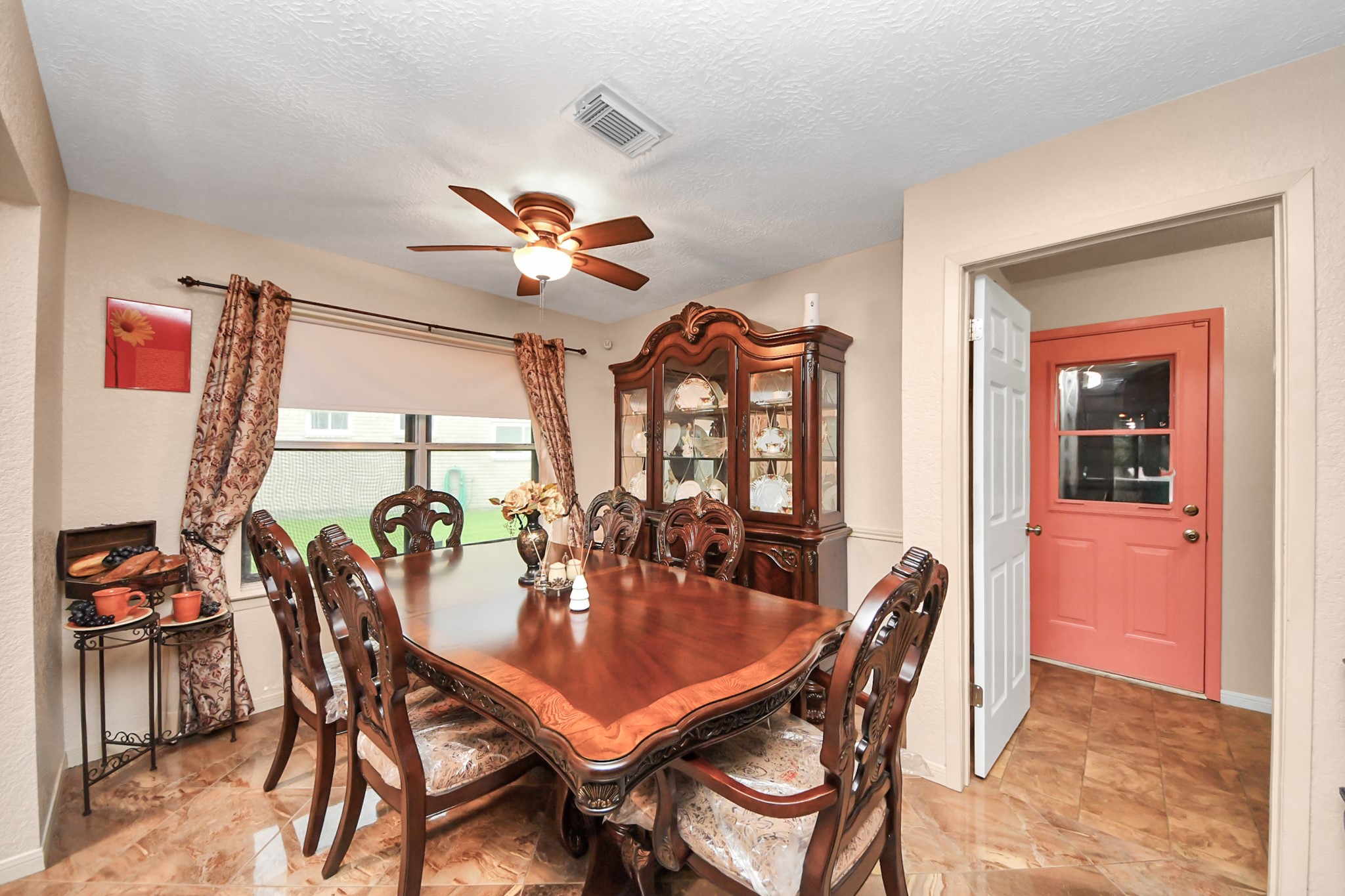 37 Wagon Ln Loop Angleton, TX 77515 - Photo 16 of 42 a view of a dining room with furniture and chandelier
