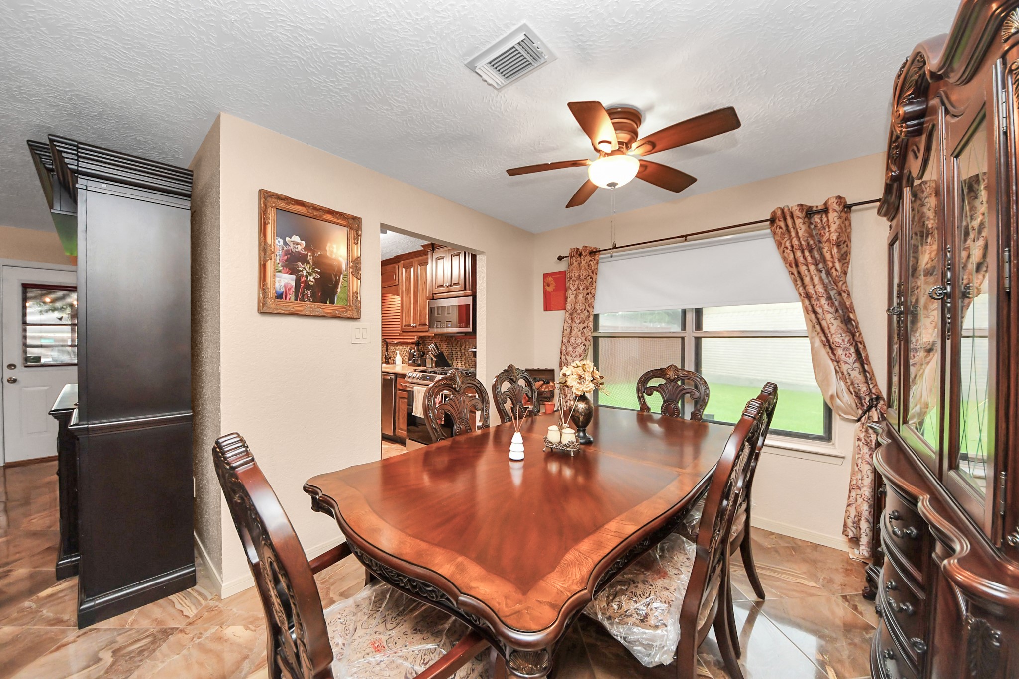 37 Wagon Ln Loop Angleton, TX 77515 - Photo 17 of 42 a dining room with furniture and window