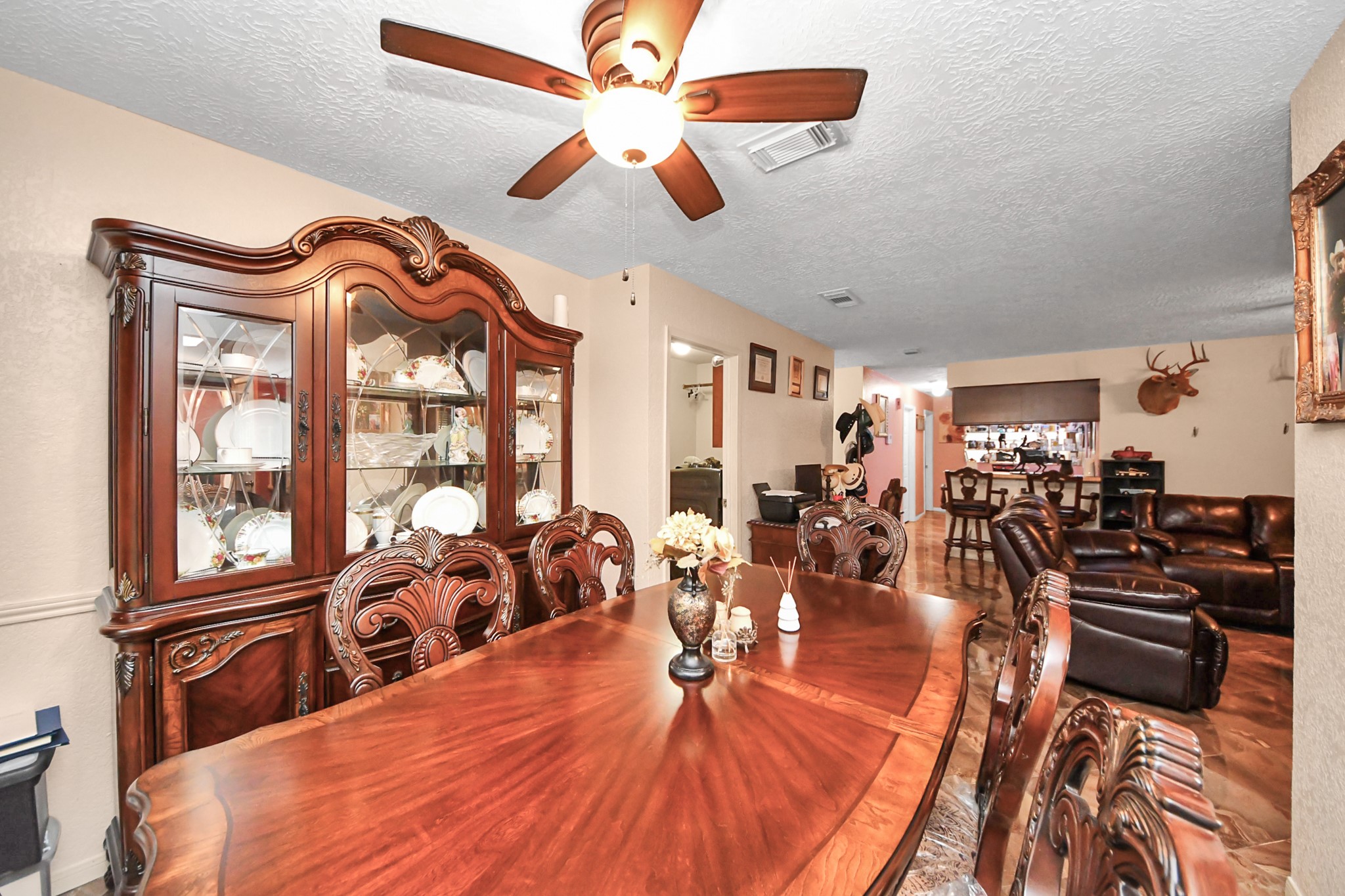 37 Wagon Ln Loop Angleton, TX 77515 - Photo 18 of 42 a very nice looking living room with a large window with kitchen view