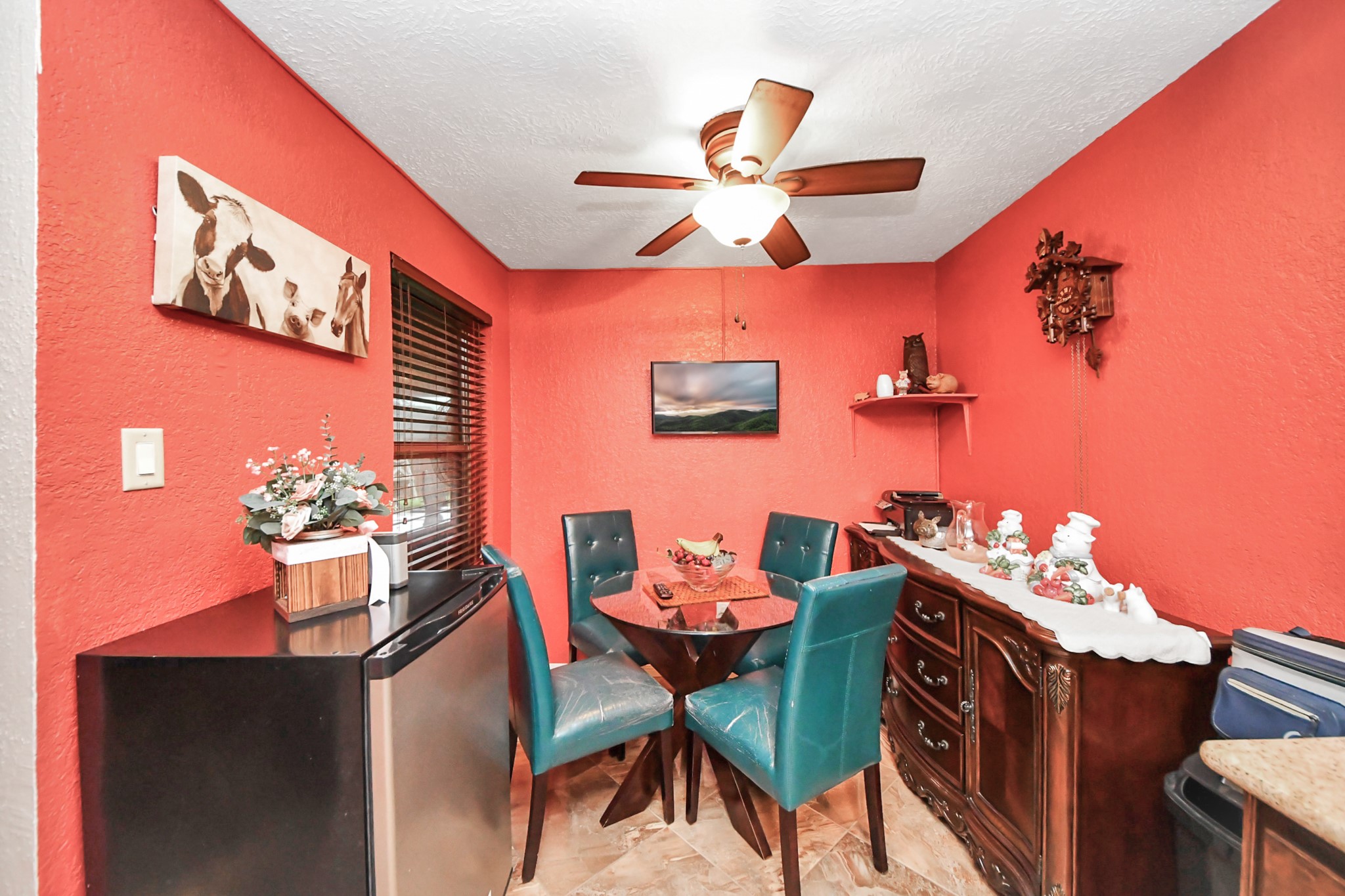 37 Wagon Ln Loop Angleton, TX 77515 - Photo 20 of 42 a dining room with furniture and a chandelier