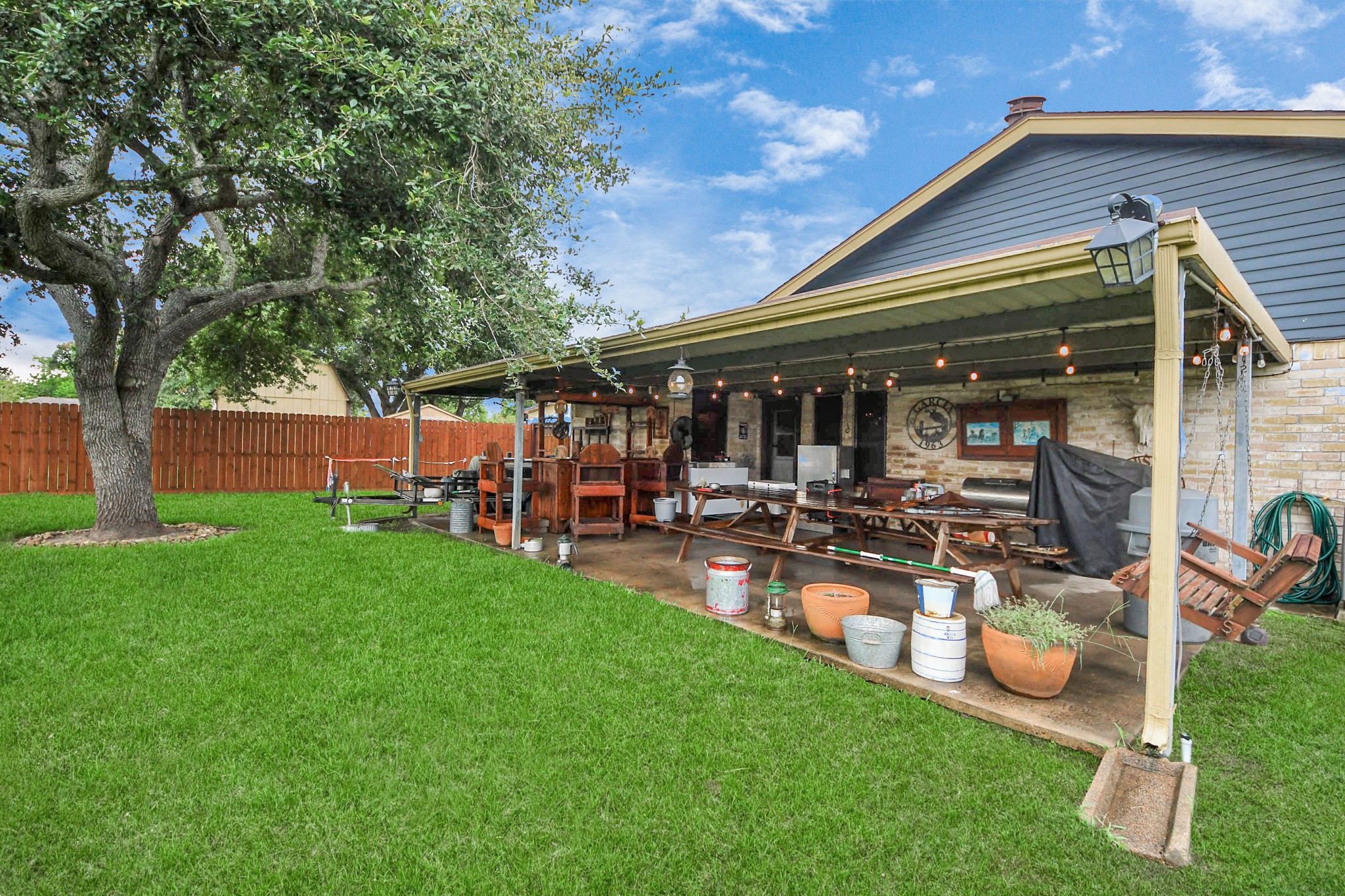 37 Wagon Ln Loop Angleton, TX 77515 - Photo 33 of 42 a view of a backyard with sitting area