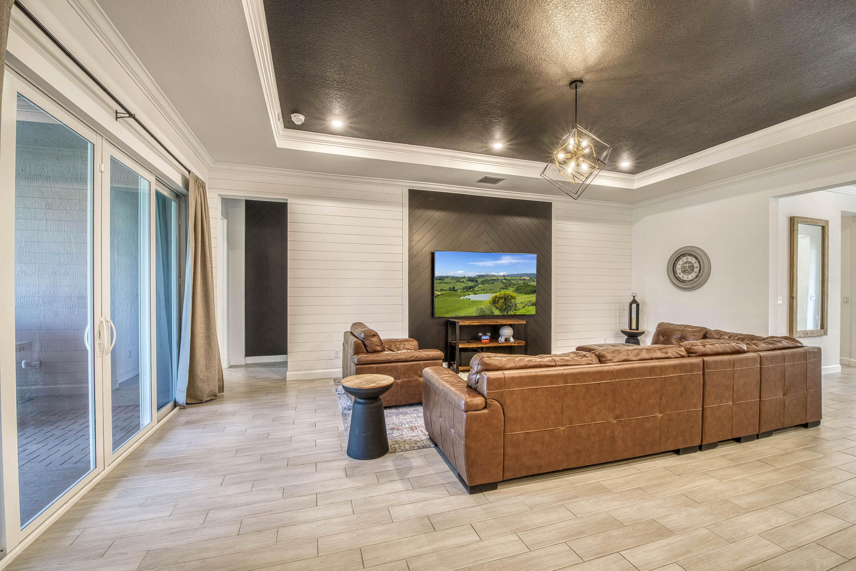 19017 Fly Rod Run Loxahatchee, FL 33470 - Photo 17 of 106 a living room with furniture and a flat screen tv