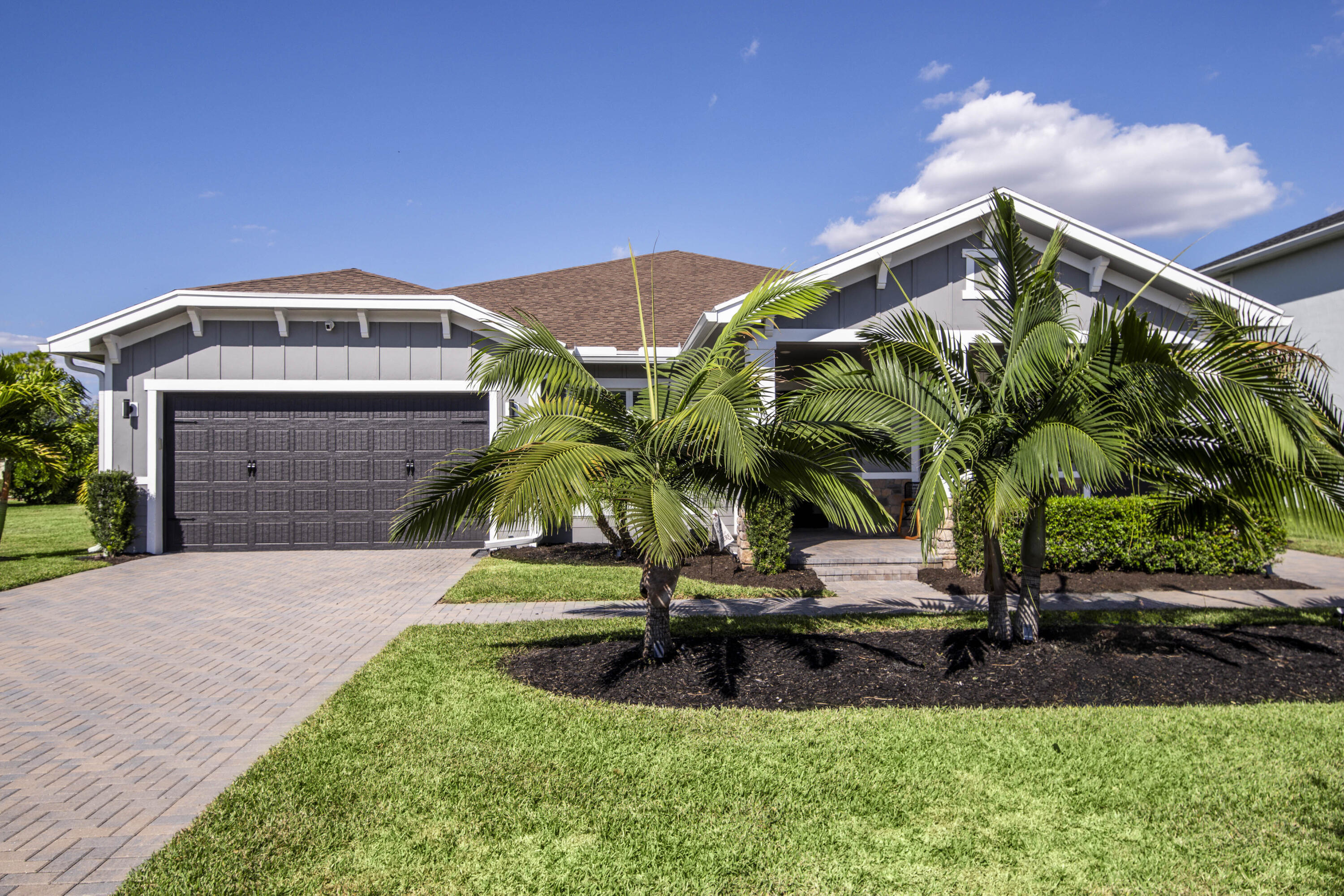 19017 Fly Rod Run Loxahatchee, FL 33470 - Photo 3 of 106 a front view of a house with a yard