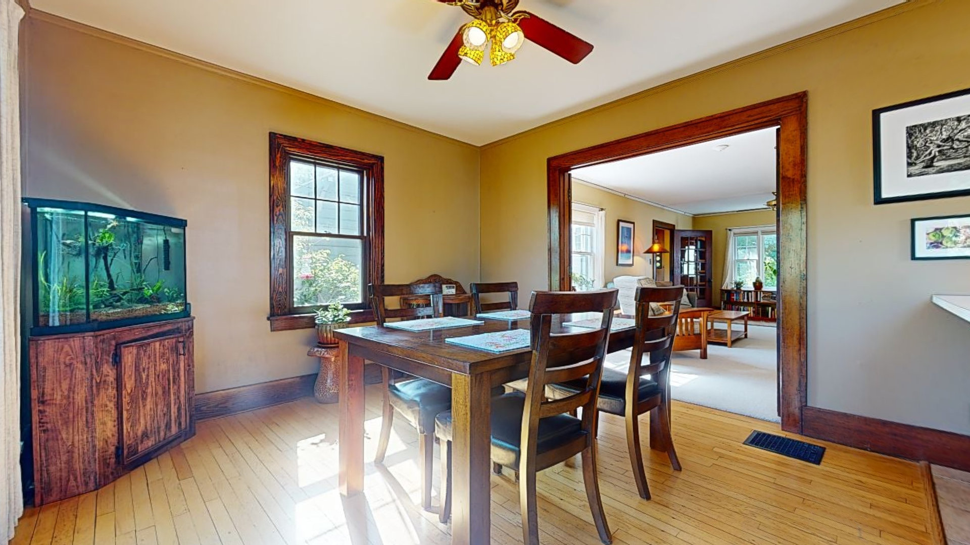 916 West Daniel Street Champaign, IL 61821 - Photo 12 of 46 a view of a dining room with furniture window and wooden floor