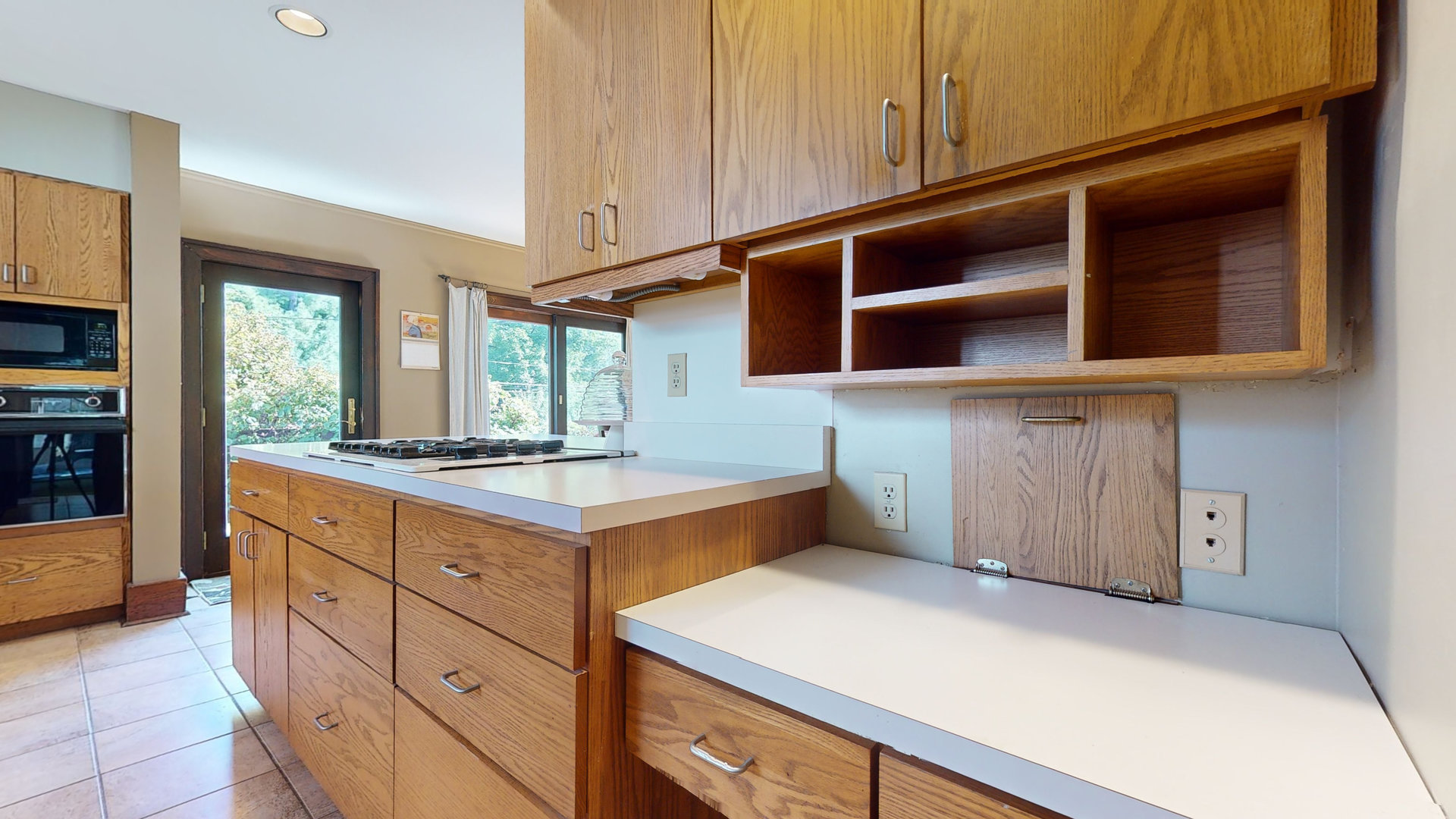 916 West Daniel Street Champaign, IL 61821 - Photo 15 of 46 a kitchen with granite countertop cabinets and window