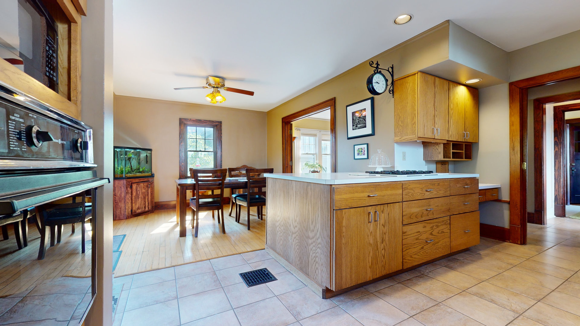 916 West Daniel Street Champaign, IL 61821 - Photo 16 of 46 a kitchen with cabinets and chairs