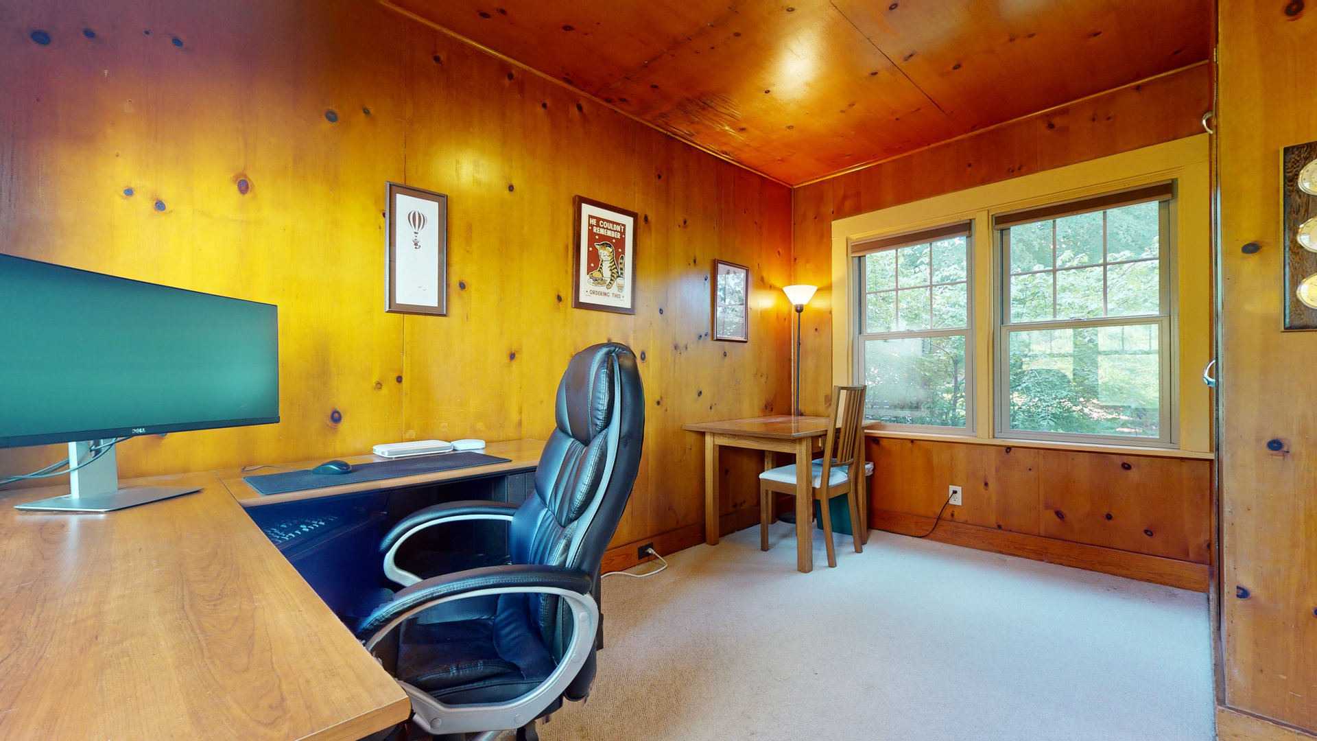 916 West Daniel Street Champaign, IL 61821 - Photo 17 of 46 a view of a workspace with furniture and a window
