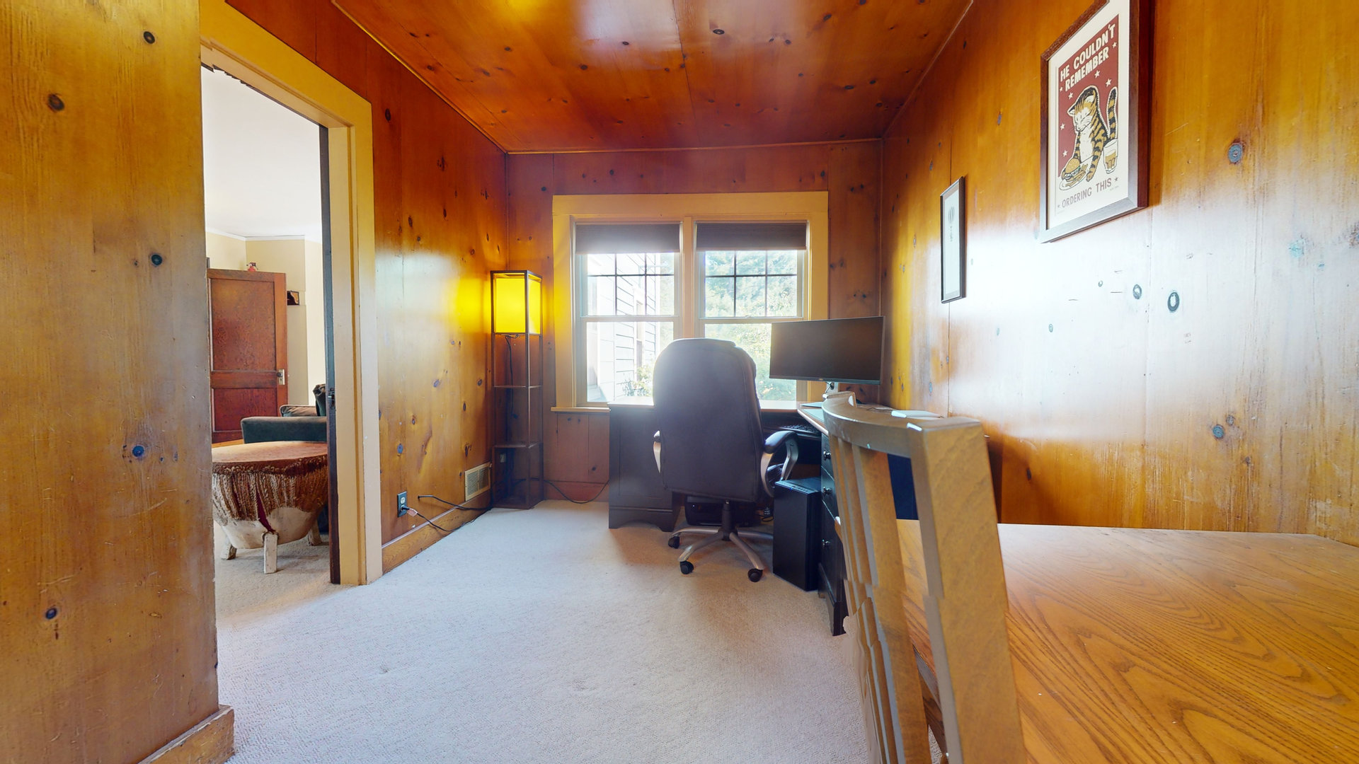 916 West Daniel Street Champaign, IL 61821 - Photo 18 of 46 a view of a workspace with furniture and a window