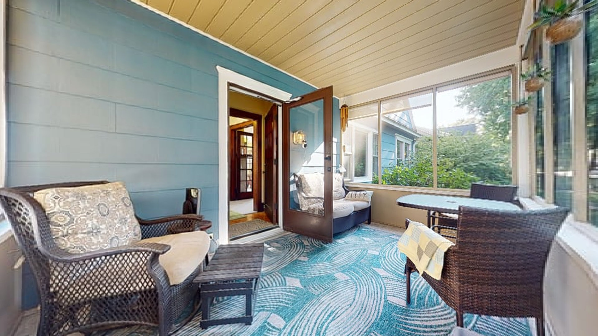 916 West Daniel Street Champaign, IL 61821 - Photo 21 of 46 a living room with furniture and a floor to ceiling window