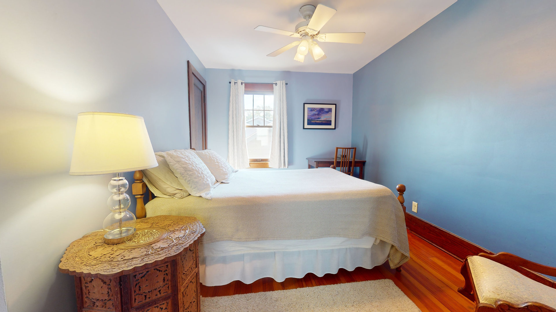 916 West Daniel Street Champaign, IL 61821 - Photo 26 of 46 a bedroom with a bed and a chandelier