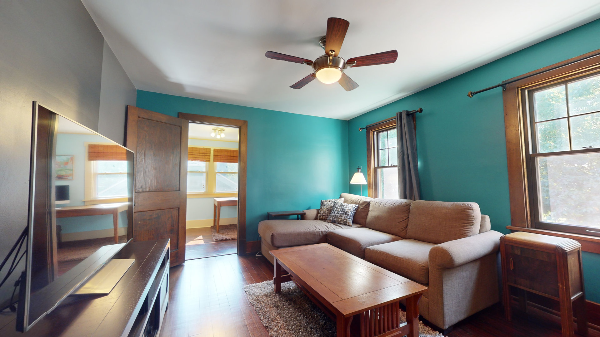 916 West Daniel Street Champaign, IL 61821 - Photo 28 of 46 a living room with furniture and a large window