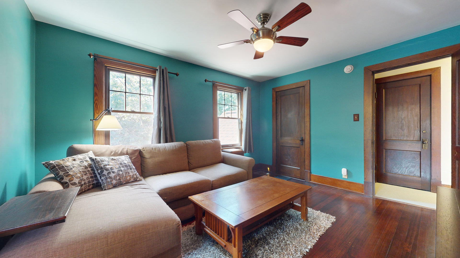 916 West Daniel Street Champaign, IL 61821 - Photo 30 of 46 a living room with furniture and a wooden floor