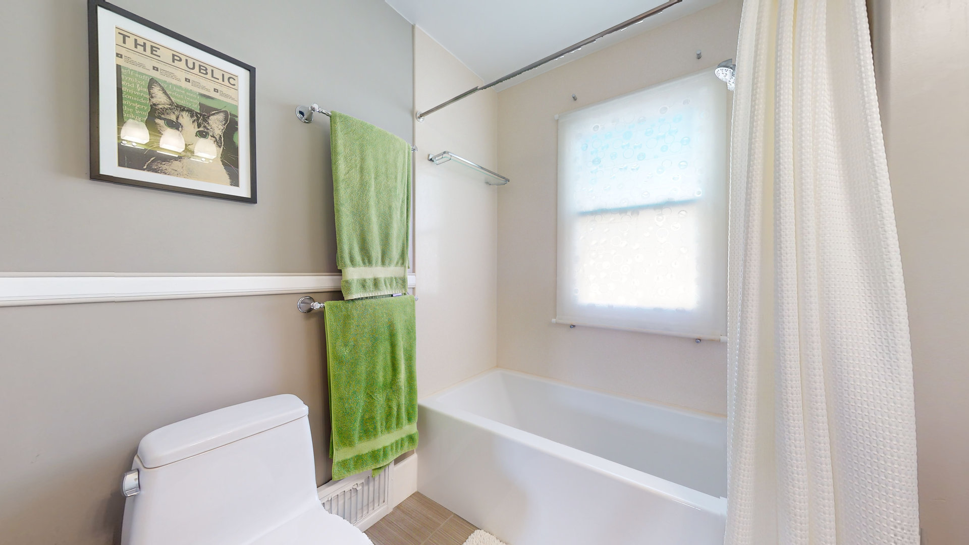 916 West Daniel Street Champaign, IL 61821 - Photo 33 of 46 a bathroom with a toilet and a bathtub