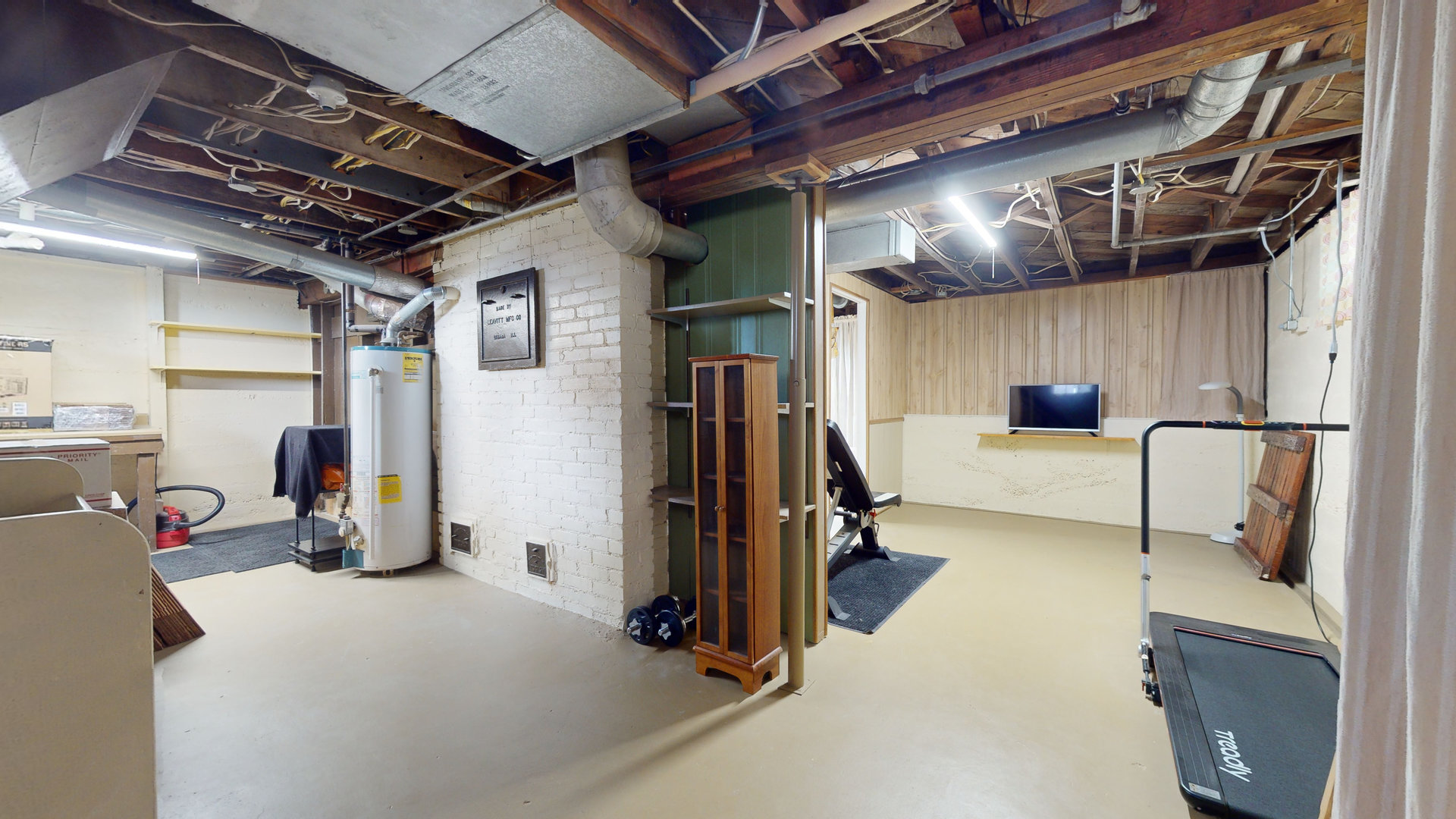 916 West Daniel Street Champaign, IL 61821 - Photo 35 of 46 a view of a room with gym equipment