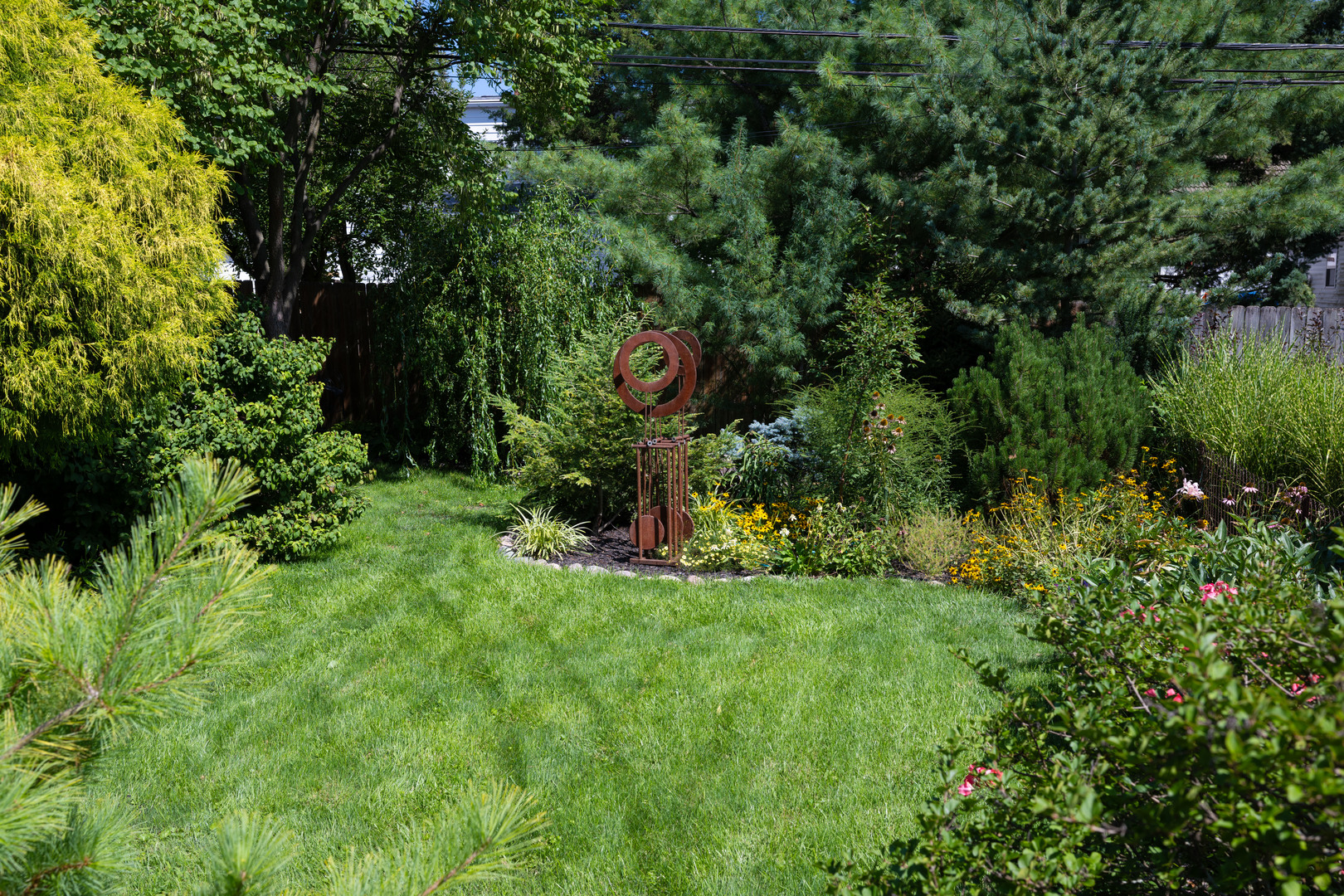 916 West Daniel Street Champaign, IL 61821 - Photo 40 of 46 a green field with lots of bushes