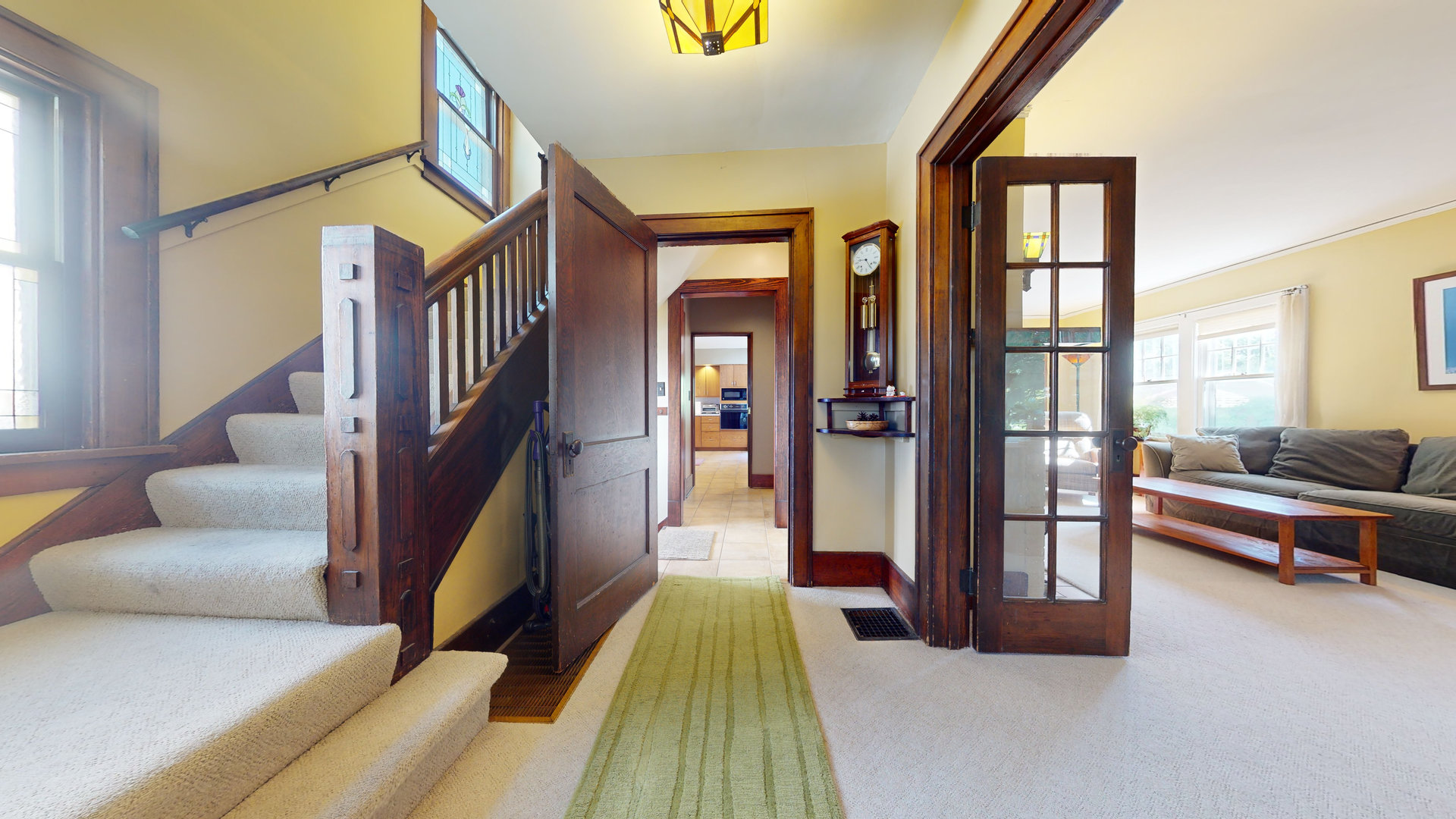 916 West Daniel Street Champaign, IL 61821 - Photo 6 of 46 a living room with furniture and a floor to ceiling window