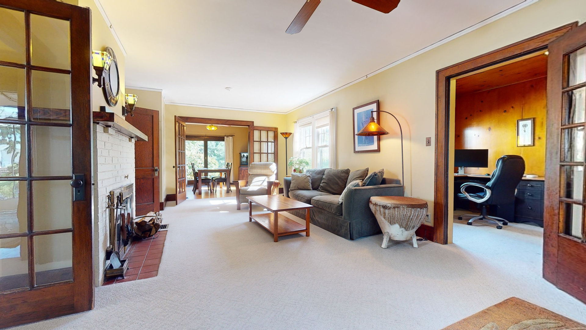 916 West Daniel Street Champaign, IL 61821 - Photo 7 of 46 a living room with furniture fireplace and a large window