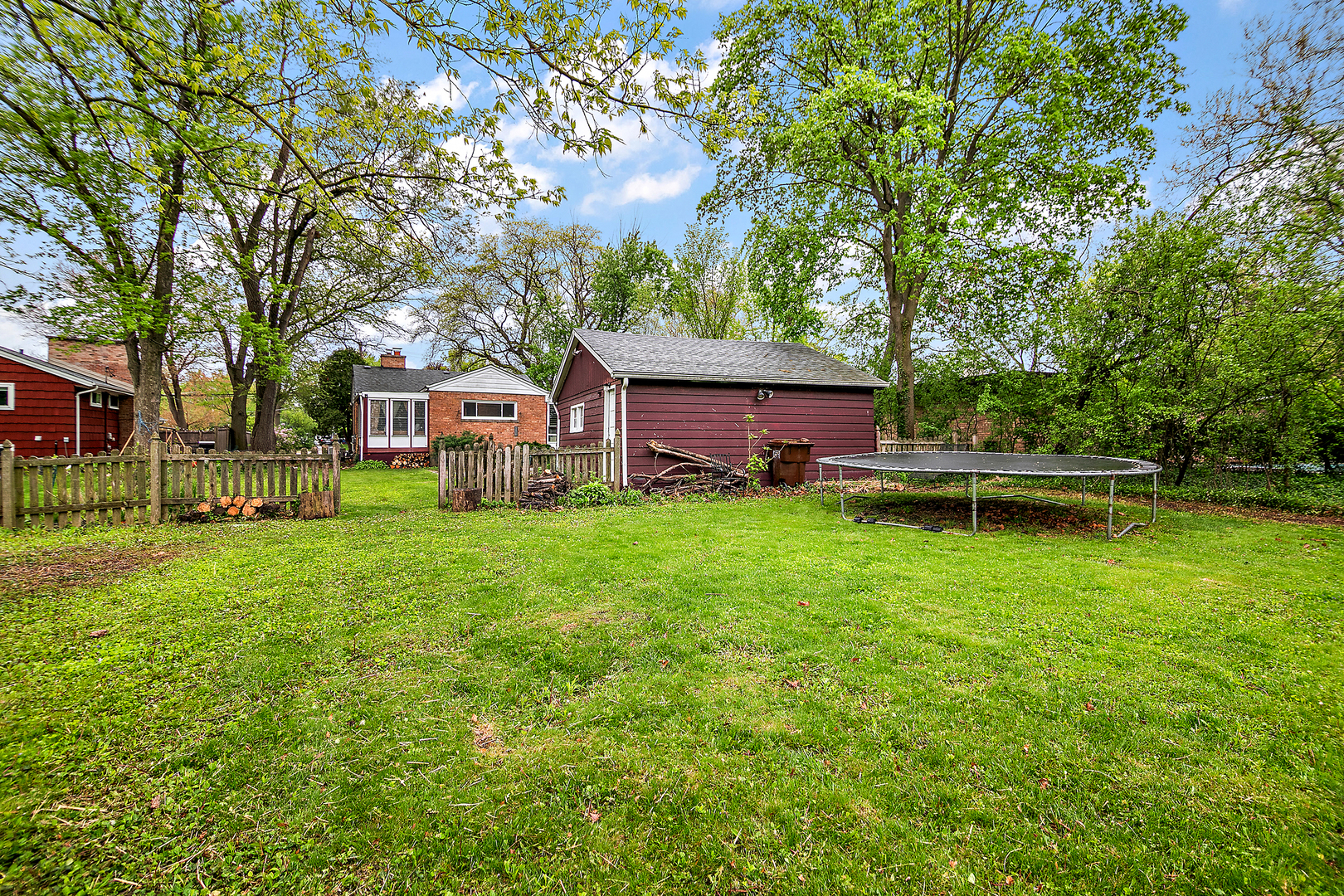 2444 183rd Street Homewood, IL 60430 - Photo 25 of 25 a front view of a house with a yard table and chairs