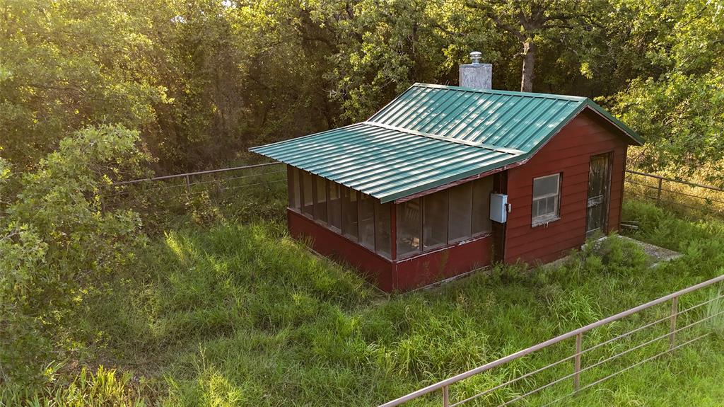 Tbd Vicars Road Bowie, TX 76230 - Photo 13 of 40 a view of a house with pool and yard