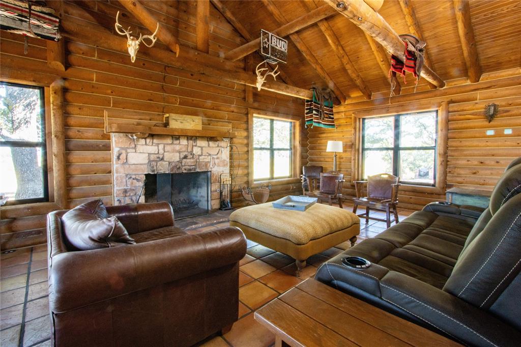 Tbd Vicars Road Bowie, TX 76230 - Photo 18 of 40 a living room with furniture and a fireplace