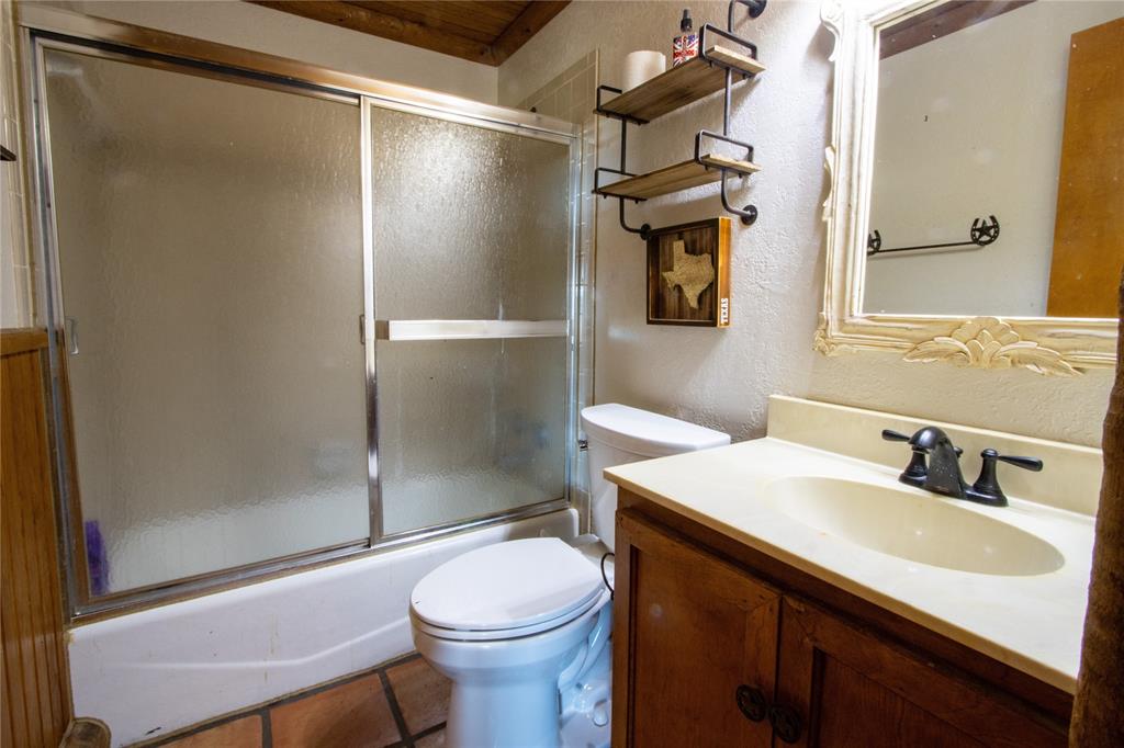 Tbd Vicars Road Bowie, TX 76230 - Photo 23 of 40 a bathroom with a sink toilet and shower