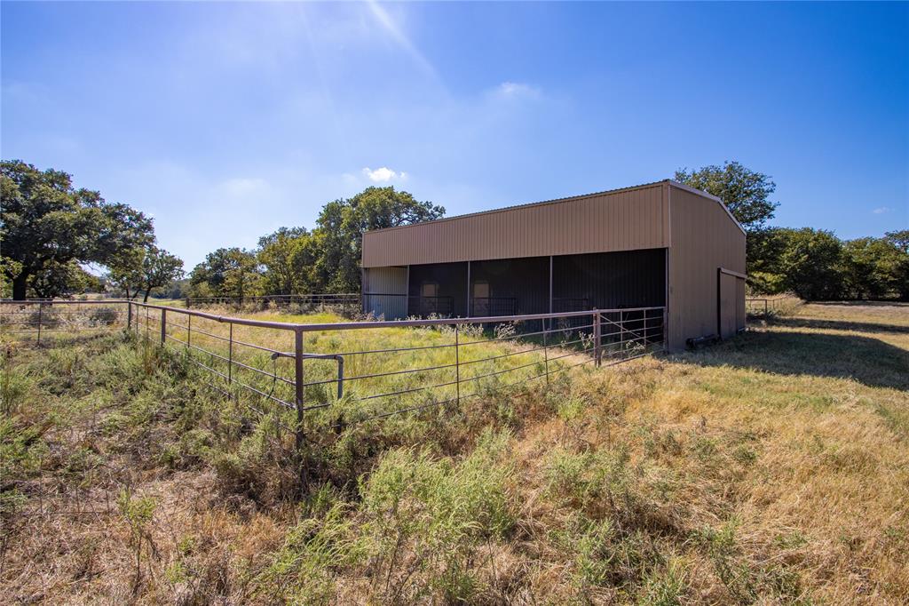 Tbd Vicars Road Bowie, TX 76230 - Photo 38 of 40 a view of swimming pool with an outdoor seating and a garden