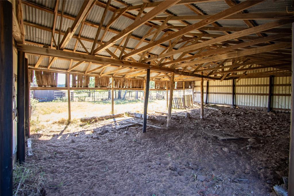 Tbd Vicars Road Bowie, TX 76230 - Photo 40 of 40 a view of an empty room with a iron stairs