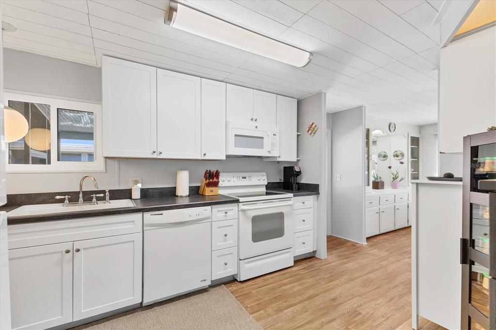 985 Jolanda Circle Venice, FL 34285 - Photo 12 of 49 a kitchen with cabinets appliances a sink and a counter space
