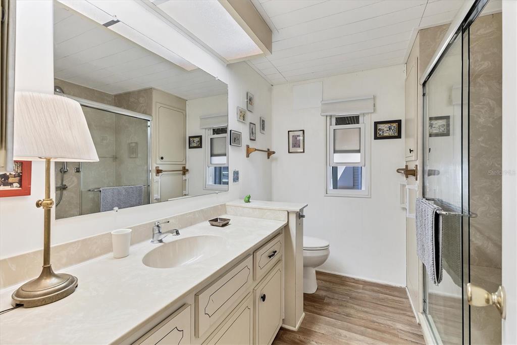 985 Jolanda Circle Venice, FL 34285 - Photo 25 of 49 a spacious bathroom with a sink double vanity and a toilet