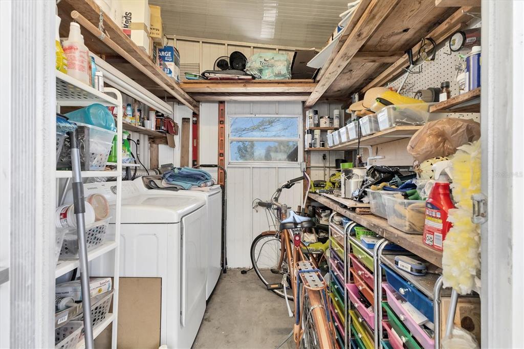 985 Jolanda Circle Venice, FL 34285 - Photo 26 of 49 a storage room with washer and dryer