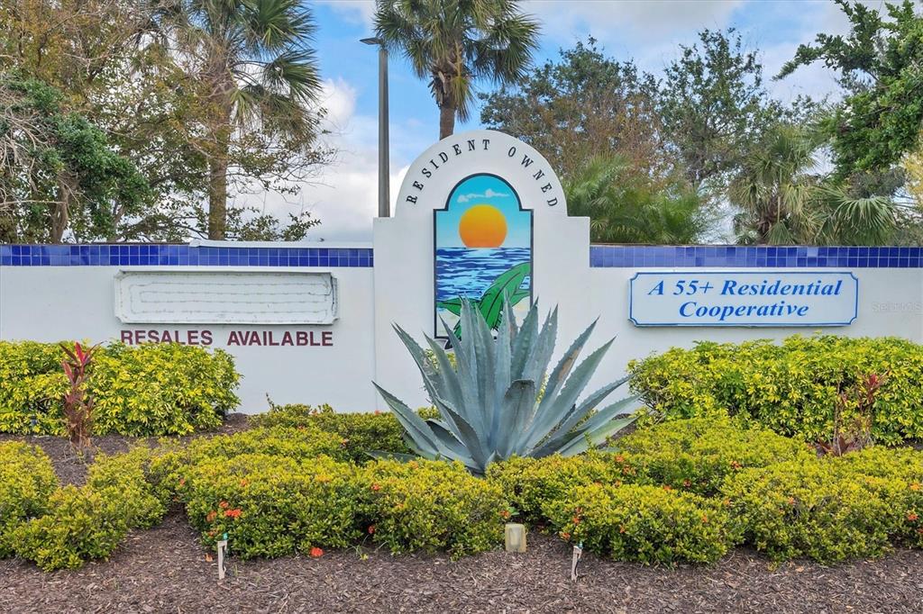 985 Jolanda Circle Venice, FL 34285 - Photo 40 of 49 a sign that is on a wall next to a road