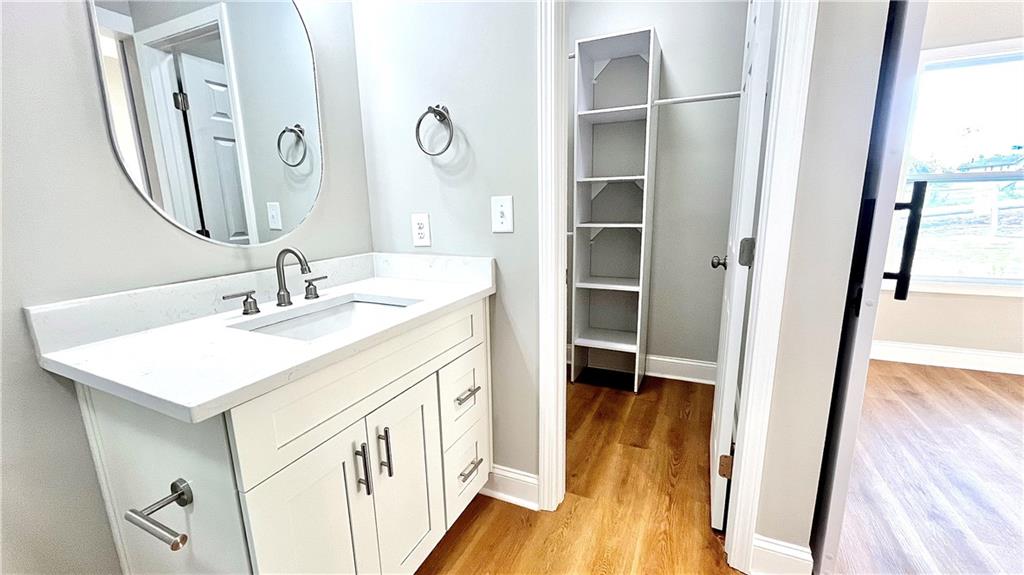 23 S Road Griffin, GA 30224 - Photo 19 of 32 a bathroom with a sink and a mirror