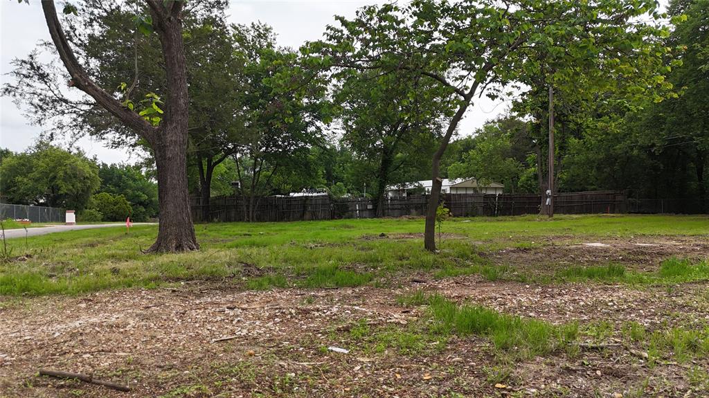 7151 Alcove Street Azle, TX 76020 - Photo 9 of 15 a backyard of a house with lots of green space