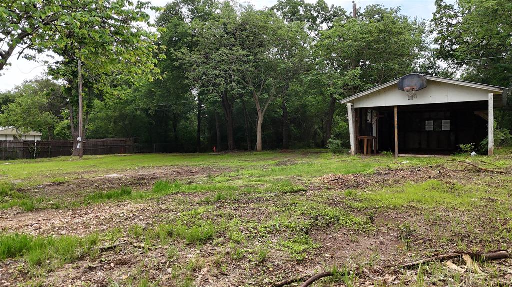 7151 Alcove Street Azle, TX 76020 - Photo 10 of 15 a house view with a garden space