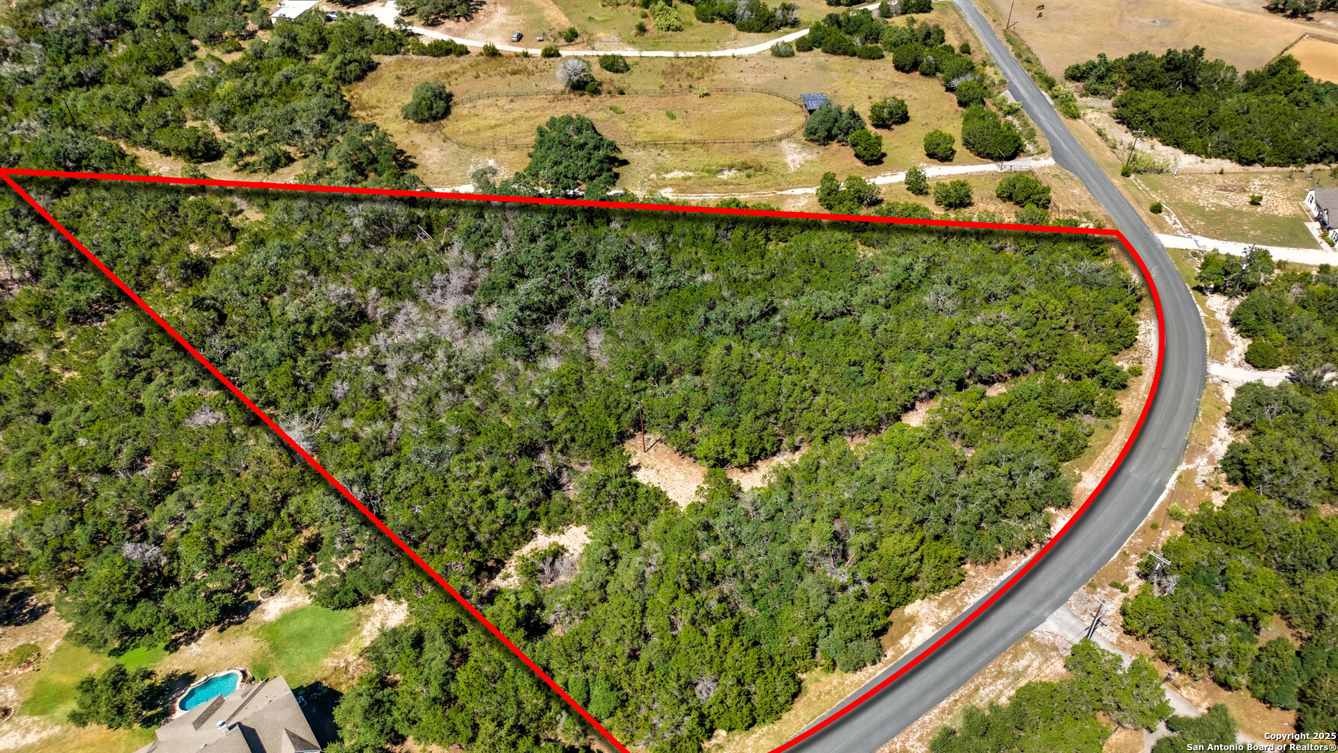 0 North Stallion Ests Drive Spring Branch, TX 78070 - Photo 5 of 17 a view of a lush green field with flowers