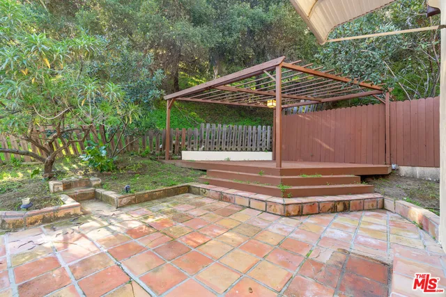 a view of a house with a yard and garage